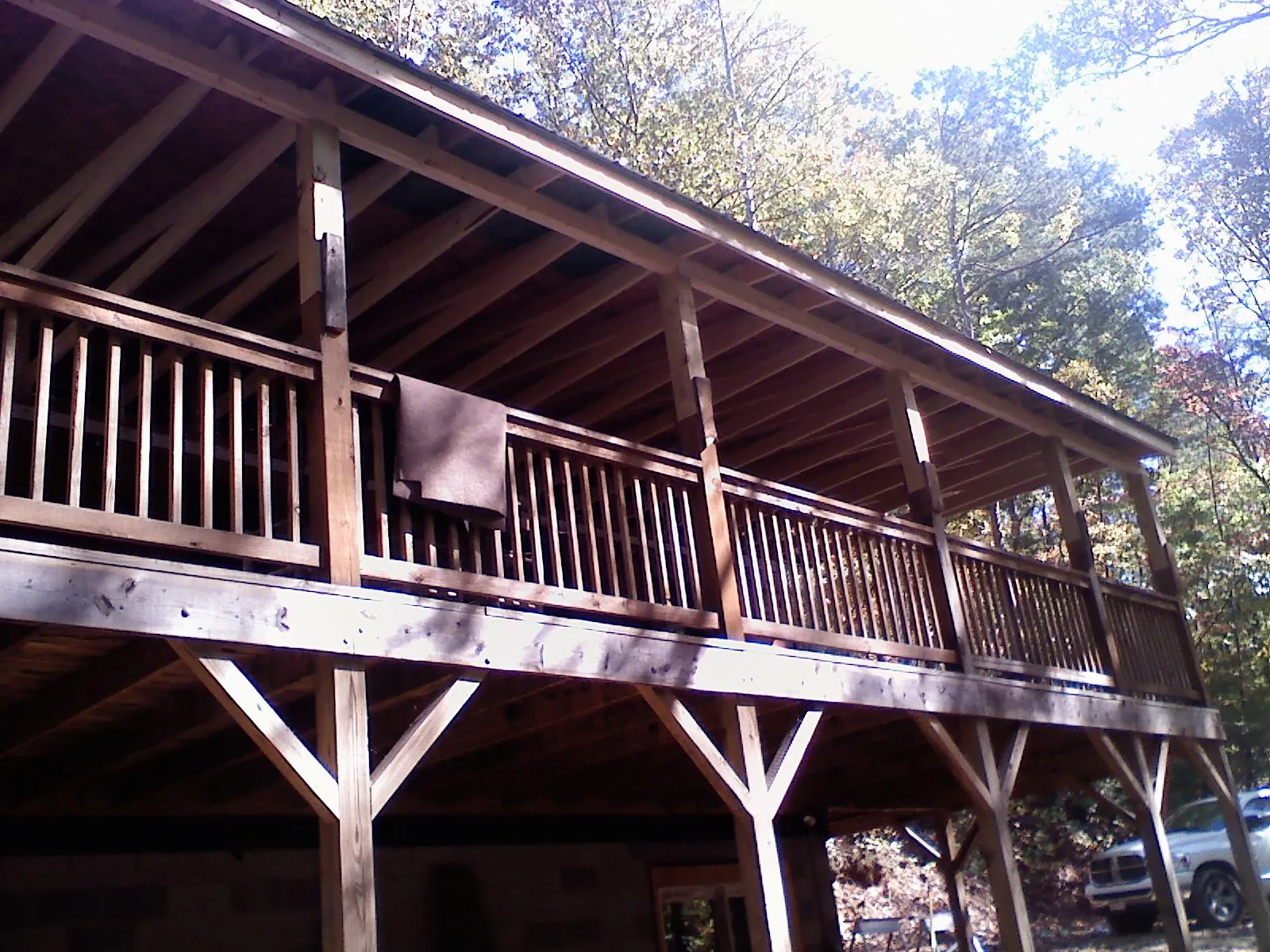 Timber framing under a new elevated porch and deck — Roof Leak Repair in Connelly by Roofing Brothers